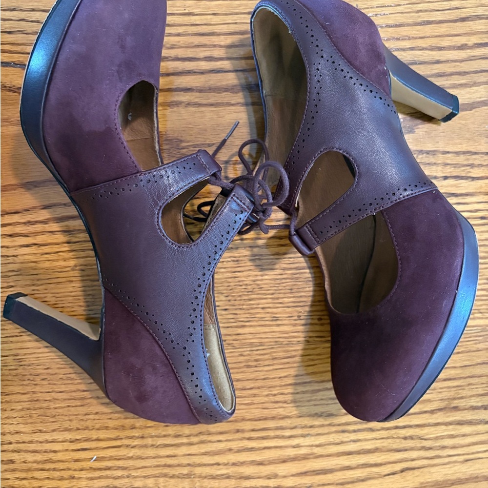 Clarks burgandy/plum heels/pumps with cutout design, lace up on top